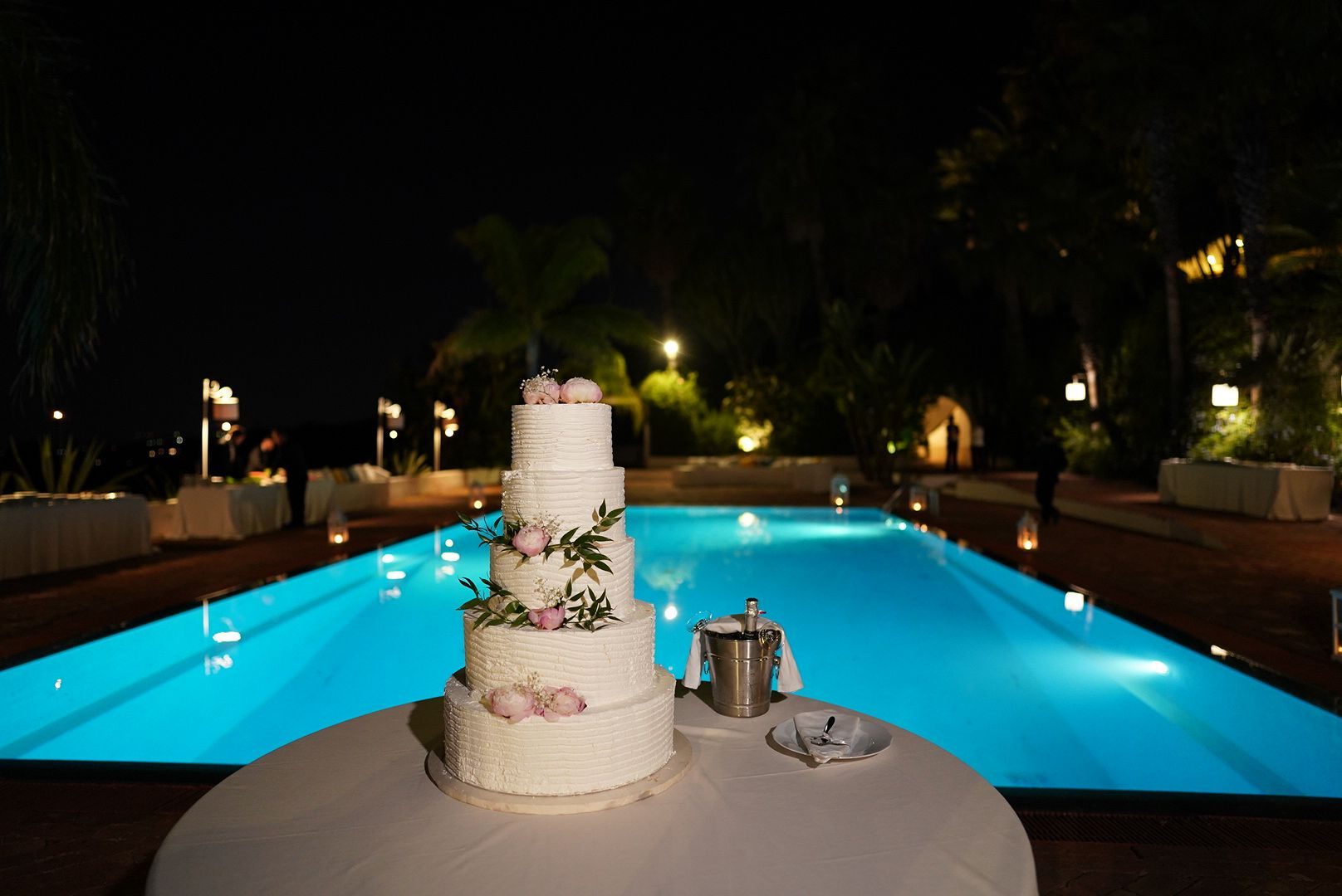 Couple walking up stone steps in Sicily